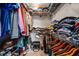 Well-organized walk-in closet with ample storage and shelving for clothes, shoes and accessories at 981 Cobb Place Manor Dr, Marietta, GA 30066