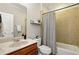 Well-maintained bathroom with vanity, shower-tub combination, and modern fixtures at 1205 New Haven Ct, Roswell, GA 30075