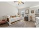 Bedroom featuring a trundle bed, vaulted ceilings and neutral decor at 1205 New Haven Ct, Roswell, GA 30075