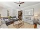 Open floor plan with seating area on second floor and view to staircase at 1205 New Haven Ct, Roswell, GA 30075