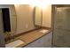 Bathroom featuring a double vanity, quartz countertop, and shower with glass door at 235 Woodland Way, Canton, GA 30114