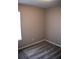 Bedroom featuring neutral walls, plush gray carpeting, and a window for natural light at 235 Woodland Way, Canton, GA 30114