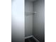 Walk-in closet featuring white wire shelving, carpeted flooring, and ample room at 235 Woodland Way, Canton, GA 30114