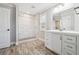 Modern bathroom with a tiled walk-in shower, wood plank flooring, and white vanity at 40 Oak Forest Dr, Oxford, GA 30054