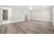 Spacious bedroom with light gray wood flooring and plenty of natural light at 40 Oak Forest Dr, Oxford, GA 30054