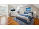 Bedroom features recessed lighting, wood floors, and a modern gray and blue color scheme at 40 Oak Forest Dr, Oxford, GA 30054