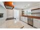 Bright kitchen featuring butcher block countertops, stainless steel appliances, and an open layout at 40 Oak Forest Dr, Oxford, GA 30054