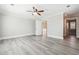 Spacious main bedroom with hardwood floors, large trim, and a walk-in closet at 40 Oak Forest Dr, Oxford, GA 30054