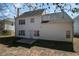 This home features a flat, private backyard with a patio perfect for entertaining at 5729 Newnan Cir, Austell, GA 30106