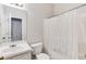 Cozy bathroom featuring a shower-tub combination, and a large mirror at 5729 Newnan Cir, Austell, GA 30106