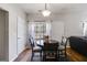 Cozy breakfast area with hardwood floors, seating for four, and natural light at 5729 Newnan Cir, Austell, GA 30106