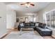 Open-concept living room features a view into the kitchen and breakfast area at 5729 Newnan Cir, Austell, GA 30106