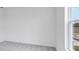 Spacious bedroom with plush carpet and a bright window at 201 Groveton Ct, Euharlee, GA 30145