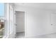 Open bedroom featuring bright windows and a walk-in closet at 201 Groveton Ct, Euharlee, GA 30145