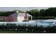 A closer view of the community pool with people swimming at 201 Groveton Ct, Euharlee, GA 30145