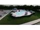 View of the community pool with lounge chairs and umbrellas at 201 Groveton Ct, Euharlee, GA 30145