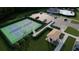 Aerial view of tennis courts, a community pool, and parking at 201 Groveton Ct, Euharlee, GA 30145