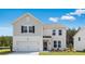 Charming two-story home with white siding, black shutters, and a well-manicured front lawn at 201 Groveton Ct, Euharlee, GA 30145
