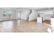 Modern kitchen featuring white cabinets, stainless steel appliances and an island with a sink at 201 Groveton Ct, Euharlee, GA 30145