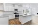 Modern kitchen featuring white cabinets, stainless steel appliances, and granite countertops at 201 Groveton Ct, Euharlee, GA 30145