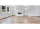 Bright living area with stylish floors, a modern fireplace, and ample natural light at 201 Groveton Ct, Euharlee, GA 30145