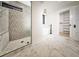 Bathroom featuring marble floors, sleek shower, soaking tub, and elegant modern fixtures at 264 Haas Ave, Atlanta, GA 30316