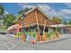 Exterior of Wylie & Rum restaurant showing the outdoor dining space at 264 Haas Ave, Atlanta, GA 30316