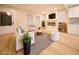 Bright living room featuring stylish furniture, modern fireplace, and hardwood floors at 264 Haas Ave, Atlanta, GA 30316