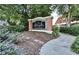 Elegant brick condominium community sign surrounded by lush landscaping and walking path at 375 Ralph Mcgill Blvd # 601, Atlanta, GA 30312