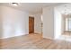 Inviting living area featuring light wood floors and a view into the kitchen at 375 Ralph Mcgill Blvd # 601, Atlanta, GA 30312