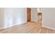 Bright living room with new laminate flooring and neutral paint, flowing into the kitchen at 375 Ralph Mcgill Blvd # 601, Atlanta, GA 30312