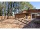 A spacious backyard with a wood fence, providing ample space for outdoor activities at 841 Lake Hollow Sw Blvd, Marietta, GA 30064