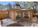 A covered patio with three sliding glass doors provides transition from the interior to the exterior at 841 Lake Hollow Sw Blvd, Marietta, GA 30064