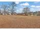 Large backyard showing the lot size, with the property and deck visible at 210 Meadow View Dr, Grayson, GA 30017