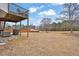 This property boasts a large backyard with a two story deck, great for entertaining guests at 210 Meadow View Dr, Grayson, GA 30017