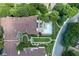 An aerial view of the condo community, lush landscaping, and a pool area at 220 Renaissance Ne Pkwy # 1105, Atlanta, GA 30308