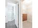 Bathroom access view shows glass shower and walk-in closet with cedar accent wall at 220 Renaissance Ne Pkwy # 1105, Atlanta, GA 30308
