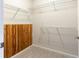 Spacious walk-in closet features wire shelving and cedar accent wall at 220 Renaissance Ne Pkwy # 1105, Atlanta, GA 30308