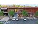 View of the City Winery and a shopping center with three cars parked in front at 220 Renaissance Ne Pkwy # 1105, Atlanta, GA 30308