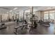 Community gym equipped with treadmills, weights, and mirrored walls at 220 Renaissance Ne Pkwy # 1105, Atlanta, GA 30308