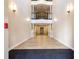 Elegant hallway with modern lighting and elevator access to residential floors at 220 Renaissance Ne Pkwy # 1105, Atlanta, GA 30308