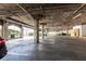 Open parking garage with designated parking spots for residents at 220 Renaissance Ne Pkwy # 1105, Atlanta, GA 30308