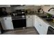 Well-lit kitchen with subway tile backsplash, stainless steel stove, and gray countertops at 4778 Pebble Trce, Buford, GA 30518
