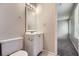 Bright bathroom featuring neutral walls, tile flooring, and a white vanity at 11111 Shannon Cir, Hampton, GA 30228