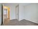 This is a bedroom with carpet and a closet at 11111 Shannon Cir, Hampton, GA 30228
