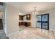Dining area is adjacent to the kitchen and features sliding glass doors to the outside at 11111 Shannon Cir, Hampton, GA 30228