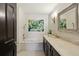 Clean bathroom boasting a soaking tub, vanity with marble countertop, and modern fixtures at 3638 Peachtree Rd # 306, Atlanta, GA 30319