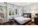 Bright bedroom with a view, art and stylish decor at 3638 Peachtree Rd # 306, Atlanta, GA 30319