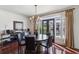 Dining area featuring a chandelier, modern furnishings, and natural light at 3638 Peachtree Rd # 306, Atlanta, GA 30319