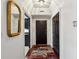 Elegant entryway features a striking dark door, and is well-lit with classic design elements at 3638 Peachtree Rd # 306, Atlanta, GA 30319